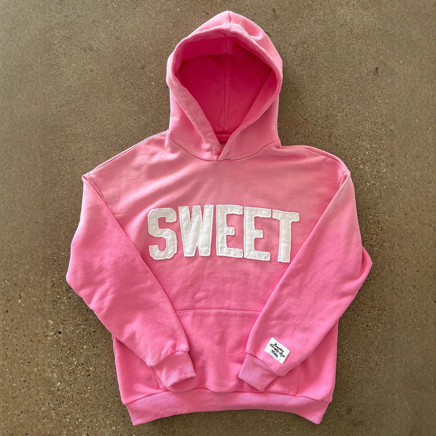 Unisex nan oversized hoodie with appliquéd letter patches and kangaroo pocket StylebySassy