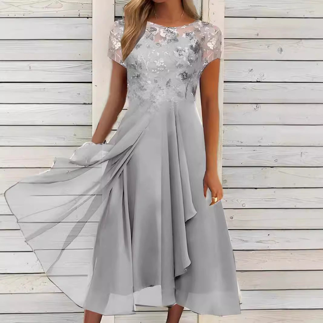 Women's flowing chiffon mid dress with floral embroidered top and asymmetrical tiered skirt StylebySassy