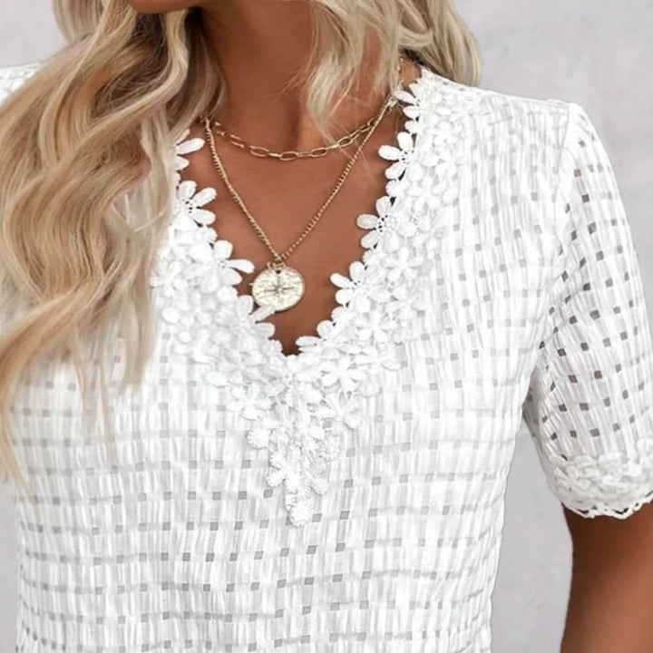 Women's lightweight structured shirt with check mesh, decorative lace trim at the V-neck and short sleeve hems StylebySassy
