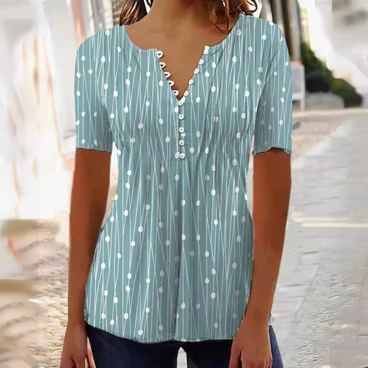 Women's lightweight tunic blouse with V-neck, decorative button placket, and empire gathering StylebySassy