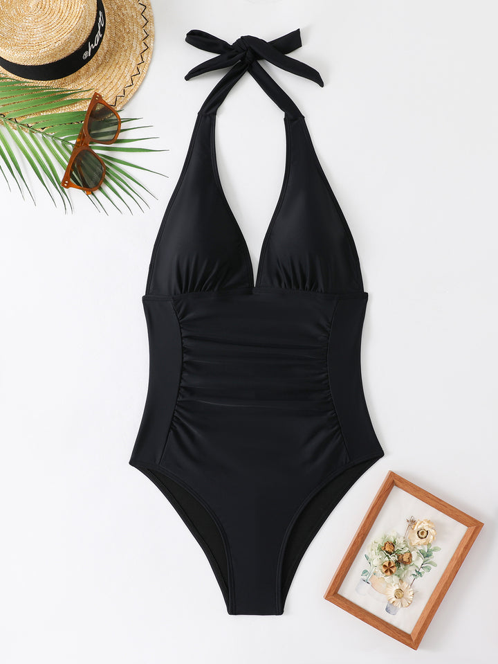 Women's swimsuit with deep V-neck and adjustable halter StylebySassy