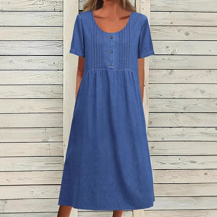 Ladies' knee-length dress in denim look with round neckline, chest piping and side inset pockets StylebySassy