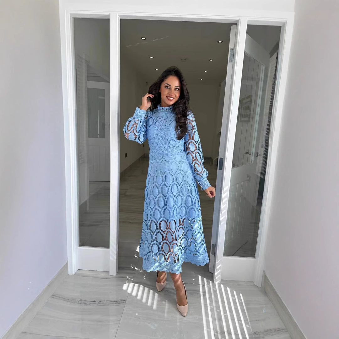 Women's crocheted midi dress with stand-up collar, transparent lace sleeves, and fitted A-line StylebySassy
