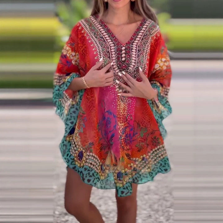 Women's short tunic kaftan with embellished V-neck and floral-animal border StylebySassy