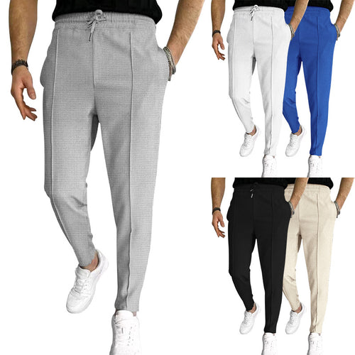 Men's tapered jogging chinos made of structured woven quality with elastic drawstring waistband and decorative crease StylebySassy