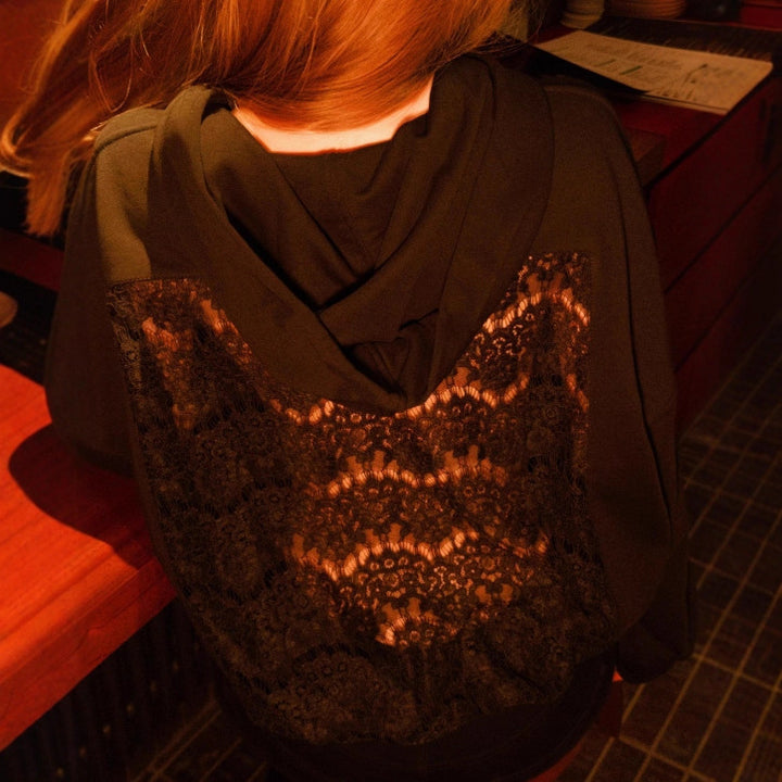 Ladies' oversized hooded sweater with floral lace insert on the back StylebySassy