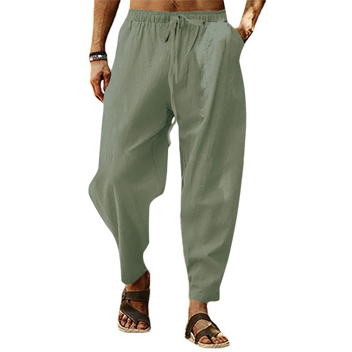 Men's relaxed summer slouch pants made of linen blend with elastic waistband and tapered ankle cuffs StylebySassy