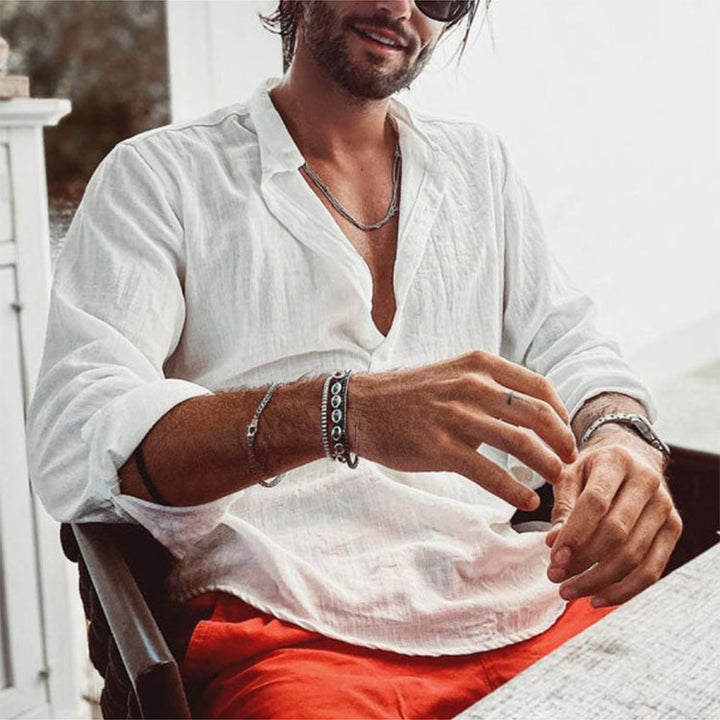 Men's casual shirt with stand-up collar, short button placket, and rounded hem StylebySassy