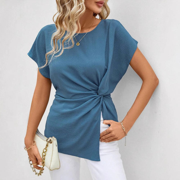 Women's fitted short sleeve draped shirt with side knot sling and textured crepe look StylebySassy