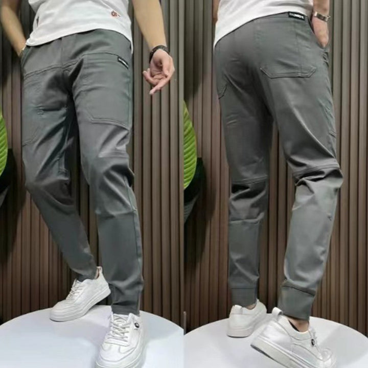 Men's sporty cargo jogger pants with elastic waistband, drawstring, and tapered leg hem StylebySassy