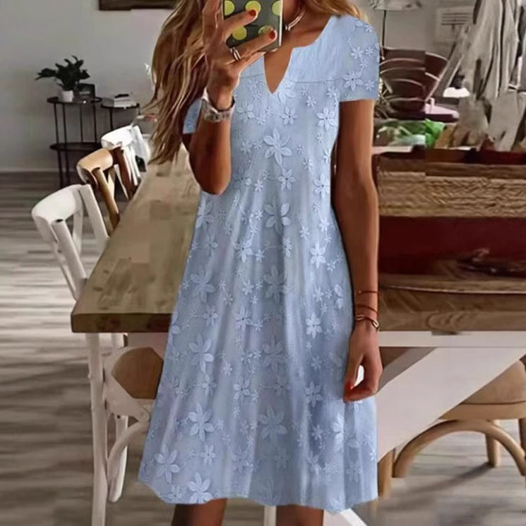 Women's knee-length A-line dress made of cotton blend with embroidered broderie overlay, short sleeves and V-neck StylebySassy