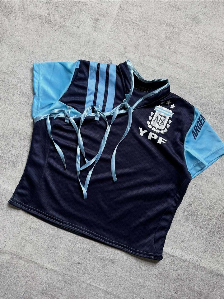 Women's sports jersey with a figure-hugging cut and innovative ties StylebySassy