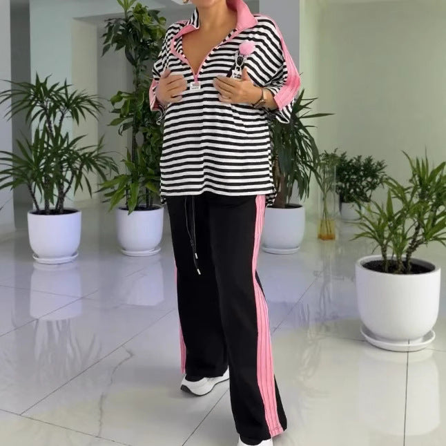 Women's casual two-piece polo lounge set with oversized stripes, pompom application, and contrasting side panels StylebySassy