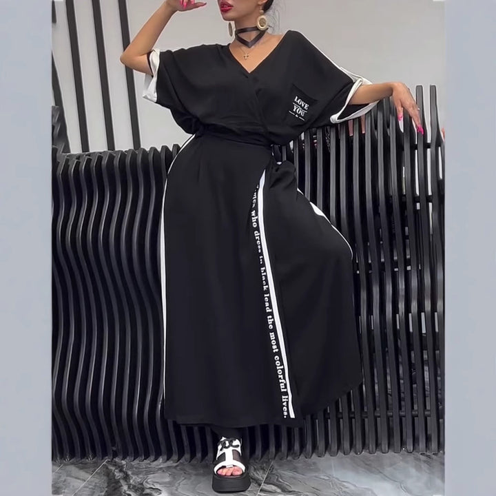 Women's sporty-elegant maxi dress with V-neck, waist belt, contrast side band, and chest pocket StylebySassy