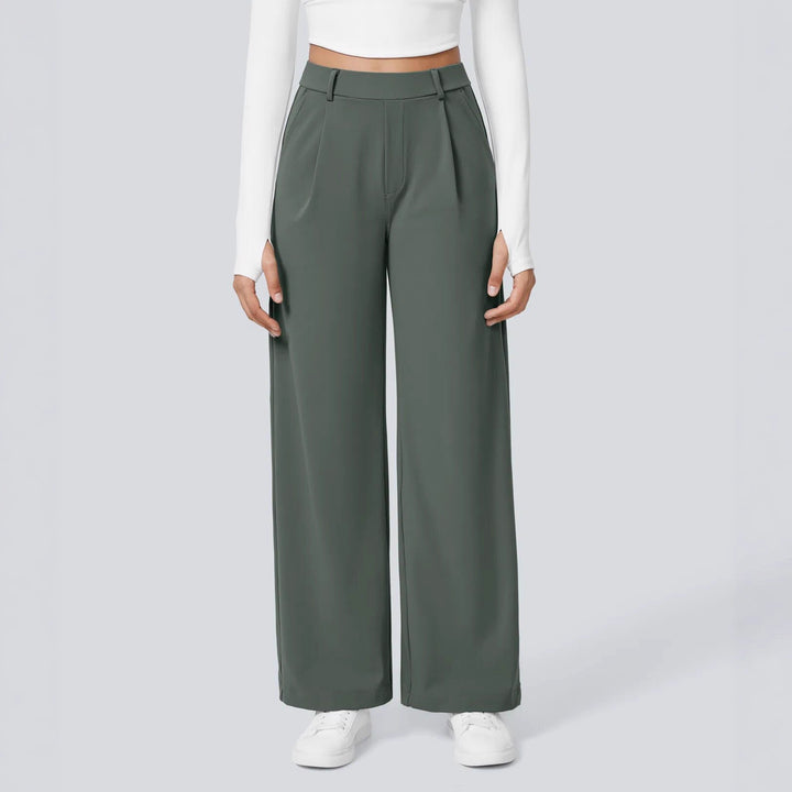 Ladies high-waisted pleated trousers with wide leg, belt loops and side pockets StylebySassy