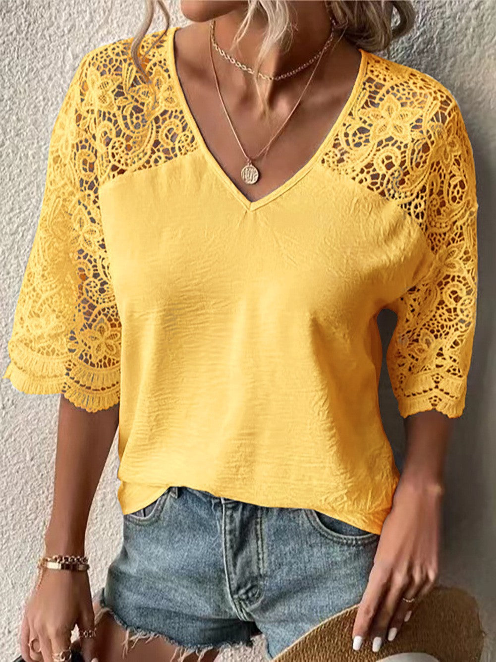 Women’s V-neck lace blouse with three-quarter crochet sleeves and crinkle look StylebySassy