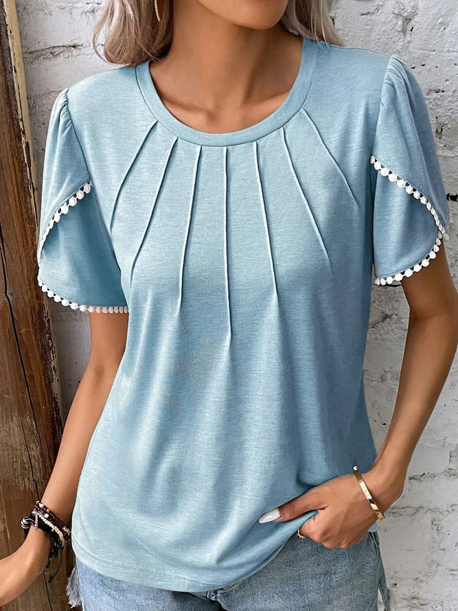 Women's round neck shirt with decorative pleated front, flutter sleeves and pompom trim StylebySassy
