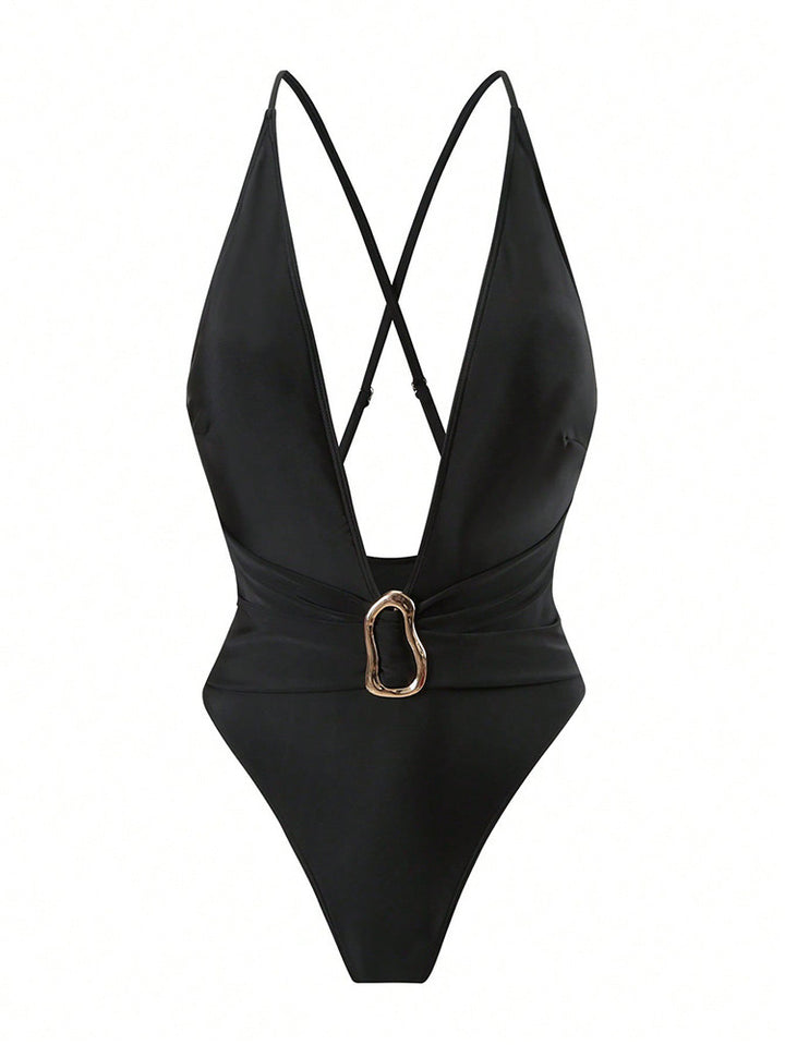 Women's one-piece swimsuit with deep V-neckline and elegant decorative element StylebySassy