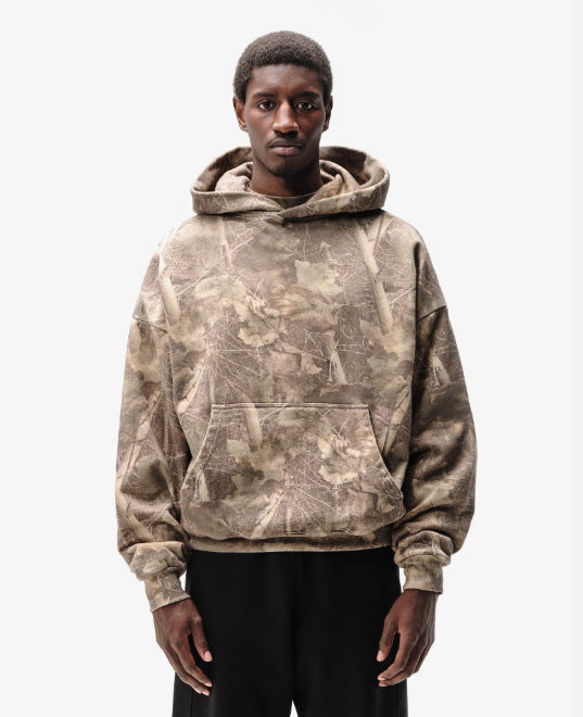 Unisex loose-fit hoodie sweatshirt with subtle leaf texture, double hood without drawstring and kangaroo pocket StylebySassy