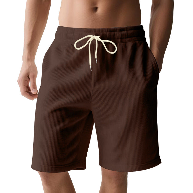 Men's knee-length Bermuda shorts with elastic waistband, drawstring, and side pockets StylebySassy
