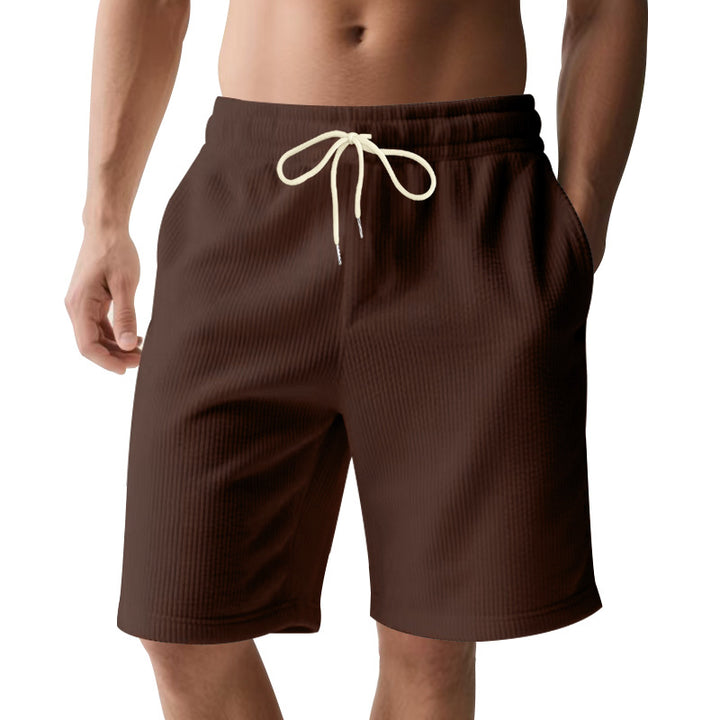 Men's knee-length Bermuda shorts with elastic waistband, drawstring, and side pockets StylebySassy