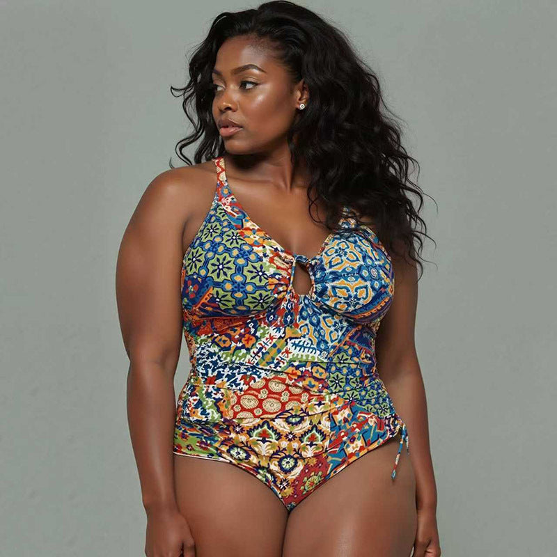 Ladies' one-piece swimsuit with playful floral pattern StylebySassy