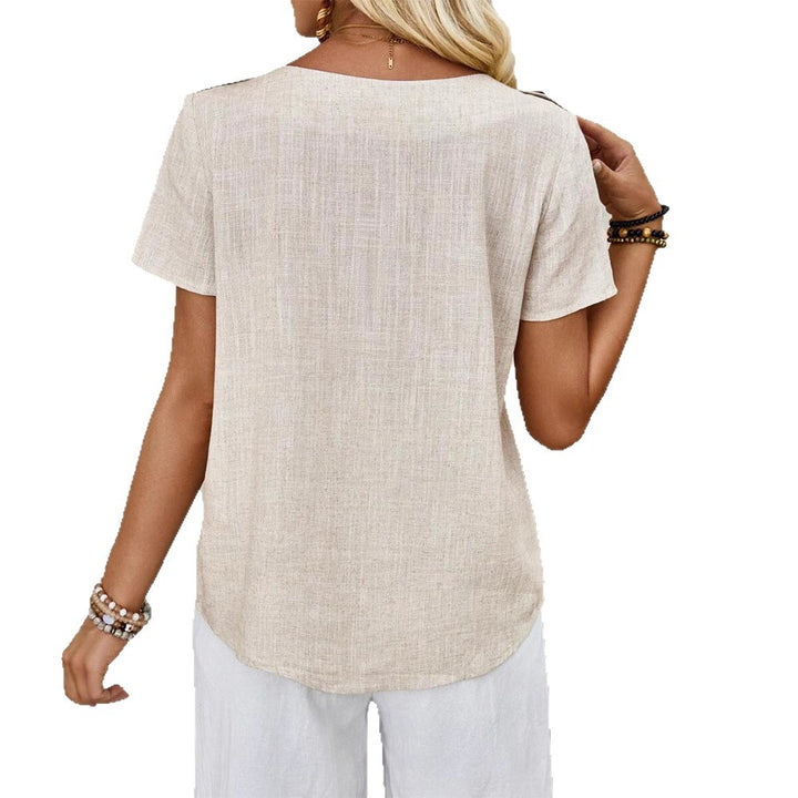 Women's relaxed fit linen blend tunic top with round neckline, wooden button details on the shoulder and curved hem StylebySassy