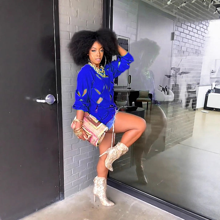 Women's loosely fitted knitted sweater with cut-out details, drawstring, and hip-length silhouette StylebySassy