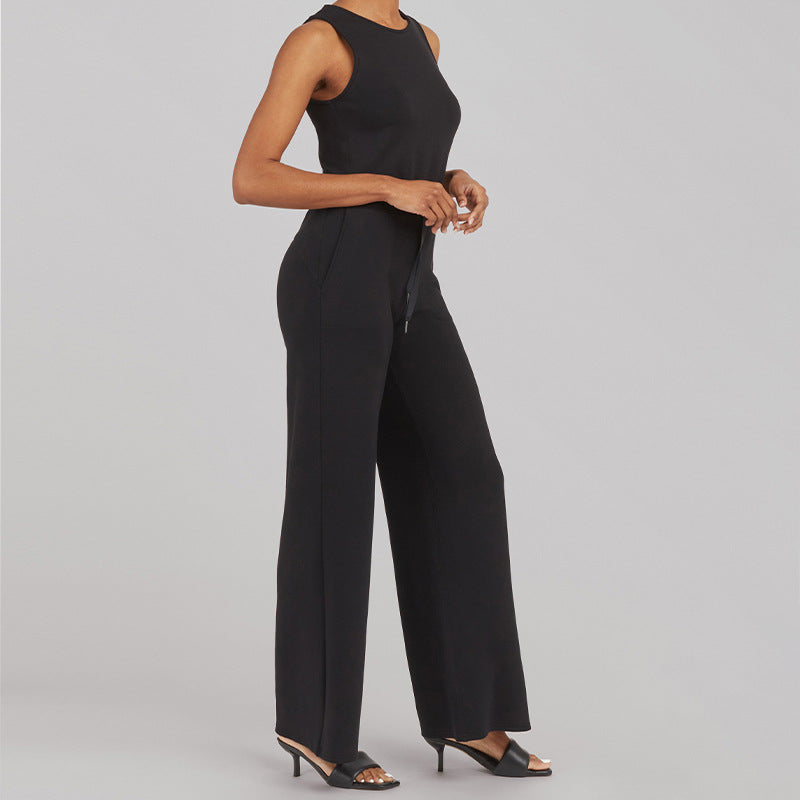 Women's sleeveless knitted jumpsuit with wide palazzo legs, drawstring waistband, and patch pockets StylebySassy