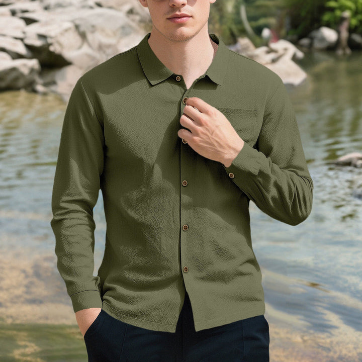 Men's casual long-sleeve shirt with Kent collar, chest pocket, and sleeve strap StylebySassy