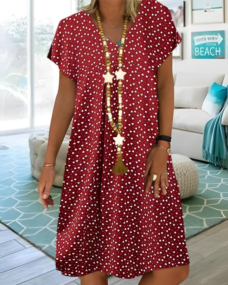 Ladies nan locker falling V-neck short dress with A-line cut, cap sleeves and all-over heart print StylebySassy
