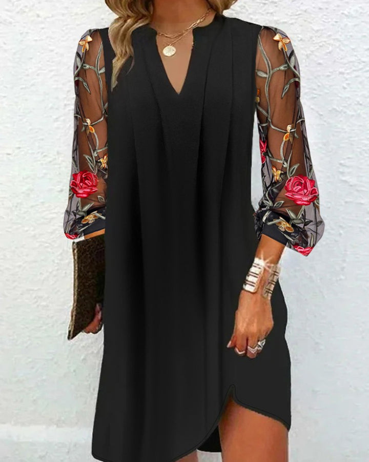 Ladies A-line dress with embroidered transparent sleeves and V-neck StylebySassy