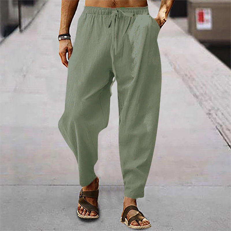 Men's relaxed summer slouch pants made of linen blend with elastic waistband and tapered ankle cuffs StylebySassy