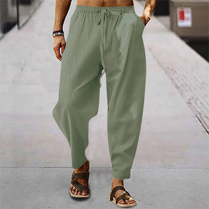 Men's relaxed summer slouch pants made of linen blend with elastic waistband and tapered ankle cuffs StylebySassy