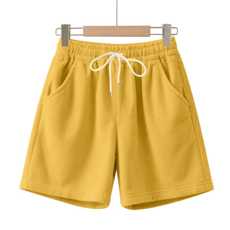 Men's ribbed jersey shorts with elastic waistband, decorative drawstring, and side slant pockets StylebySassy
