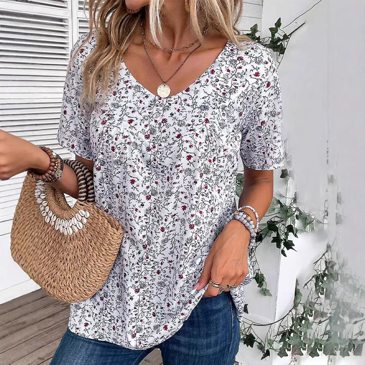 Ladies nan locker cut short sleeve blouse with V-neck, fine floral print and pleat StylebySassy