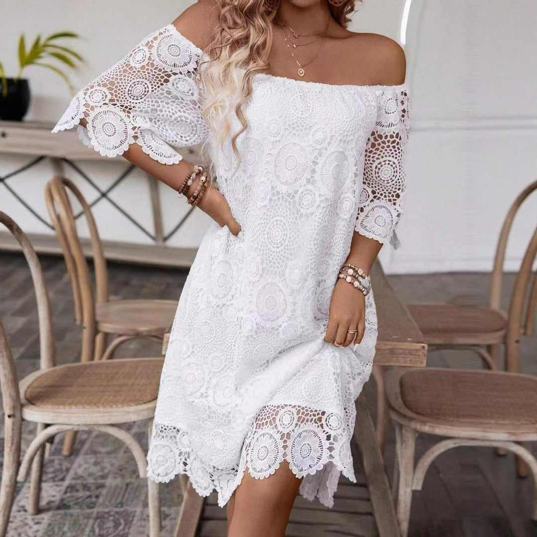 Women's off-shoulder crochet midi dress with sweetheart neckline and floral lace trim StylebySassy