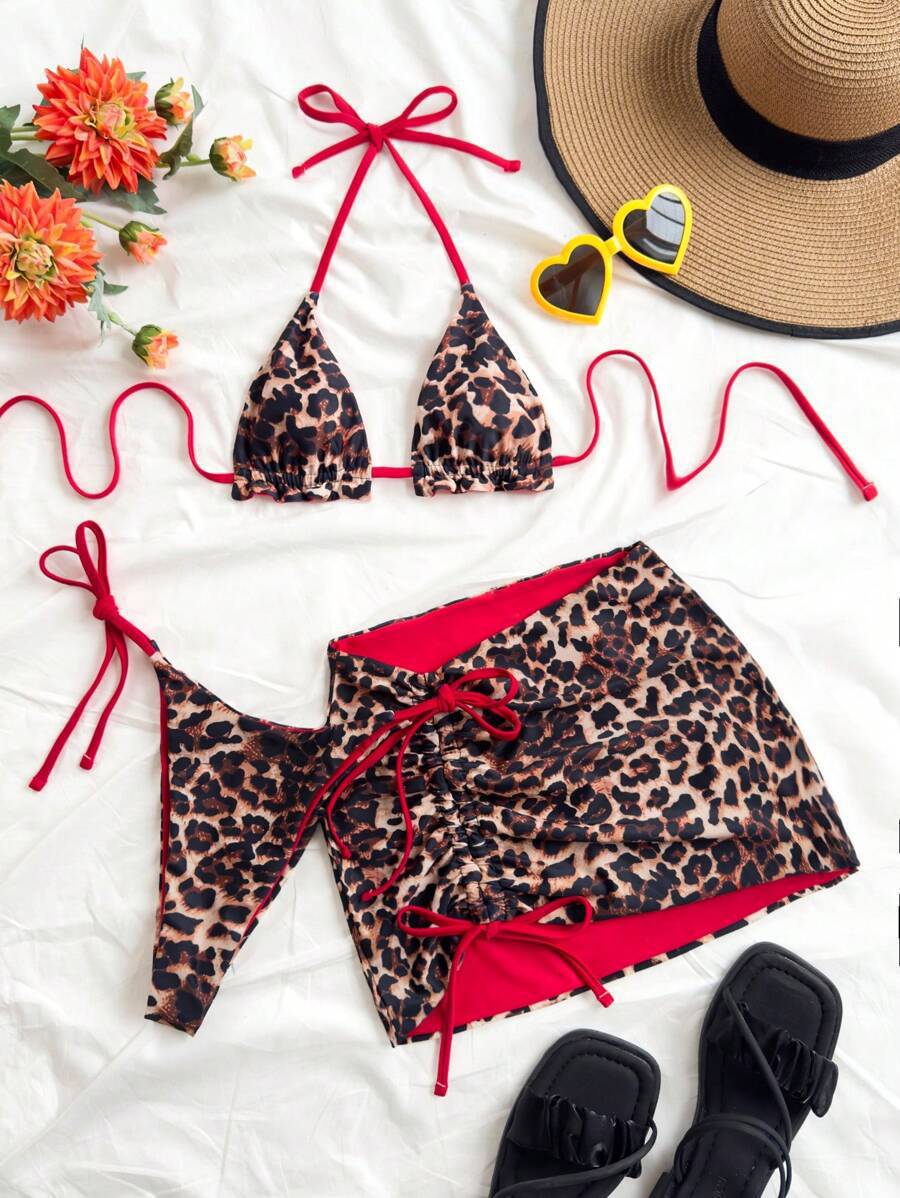 Women's triangle bikini set with ruffle-free details and wrap skirt StylebySassy