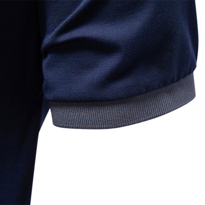 Men's breathable polo shirt made of cotton blend with contrast collar and ribbed sleeve cuffs StylebySassy