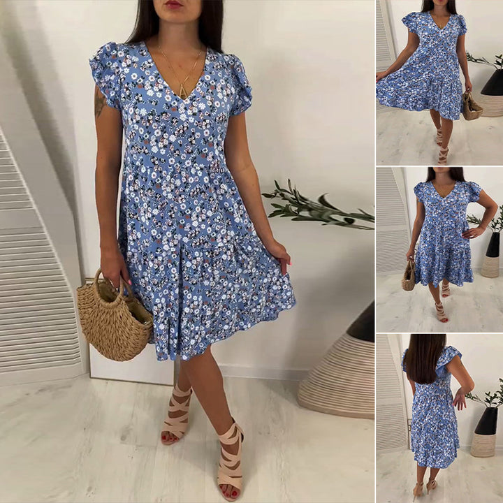 Ladies' V-neck tiered dress with puff sleeves and fitted underbust seam StylebySassy
