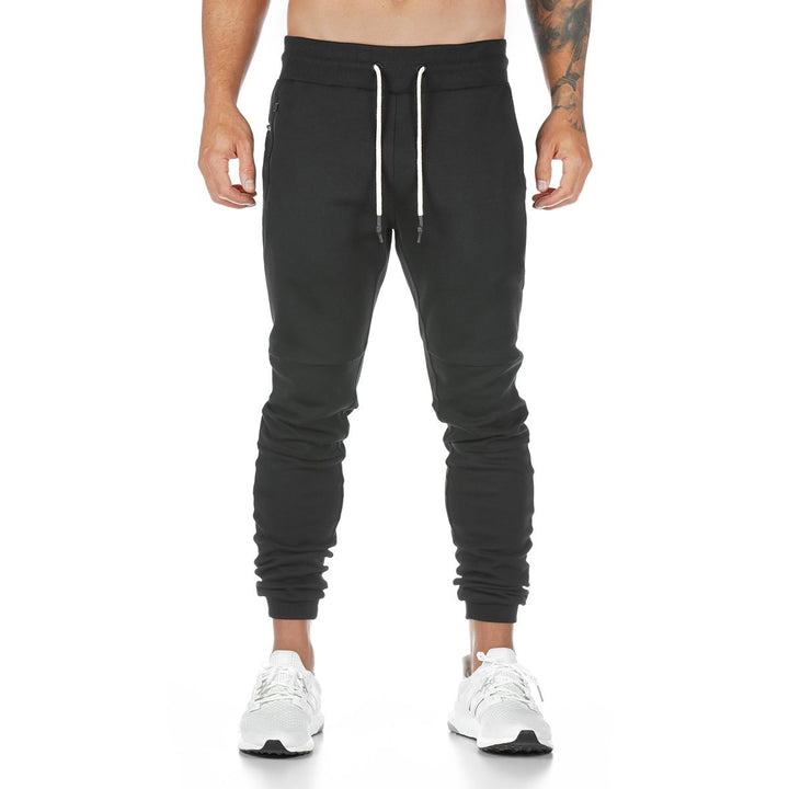 Men's narrow-cut joggers with ribbed waistband, zip pocket, and knee darts StylebySassy
