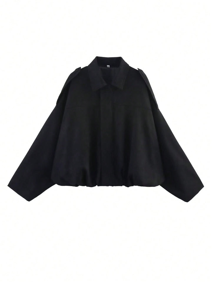 Women's loose short jacket with balloon hem, concealed closure and shoulder flaps StylebySassy