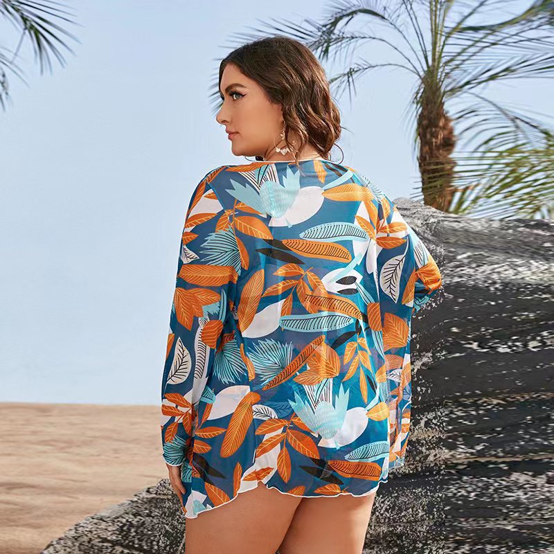 Women's bikini set with floral wrap top and elegant beach jacket StylebySassy