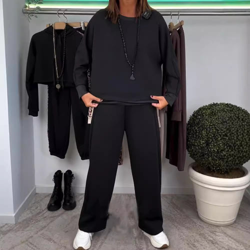 Women’s oversized jogging set with boxy sweatshirt and wide palazzo pants with decorative side stripe StylebySassy