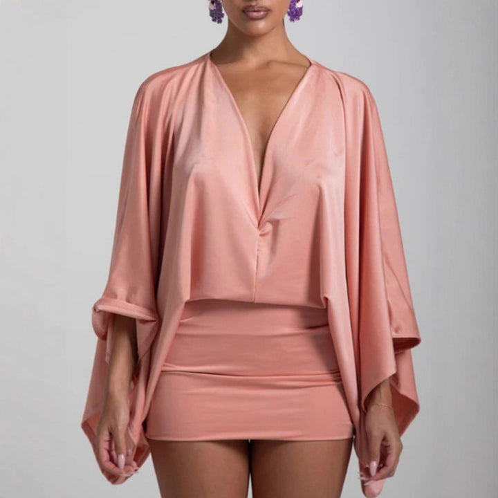 Women nan cape mini dress with deep V-neck, batwing sleeves and tailored mini skirt StylebySassy