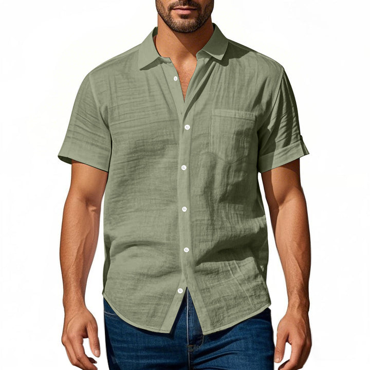 Men's short-sleeved casual shirt made of linen blend with chest pocket and rounded hem StylebySassy