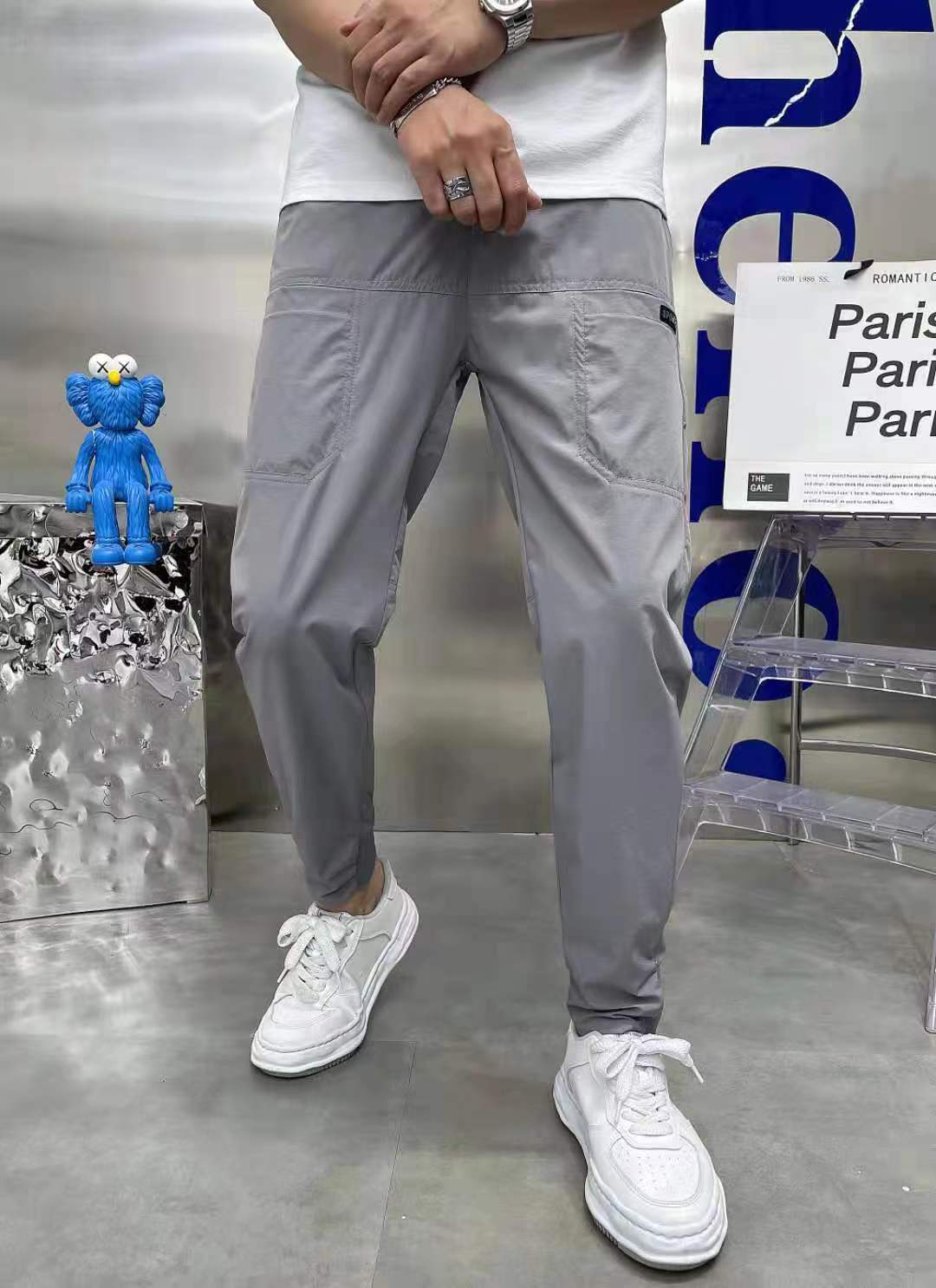 Men's sporty cargo jogger pants with elastic waistband, drawstring, and tapered leg hem StylebySassy