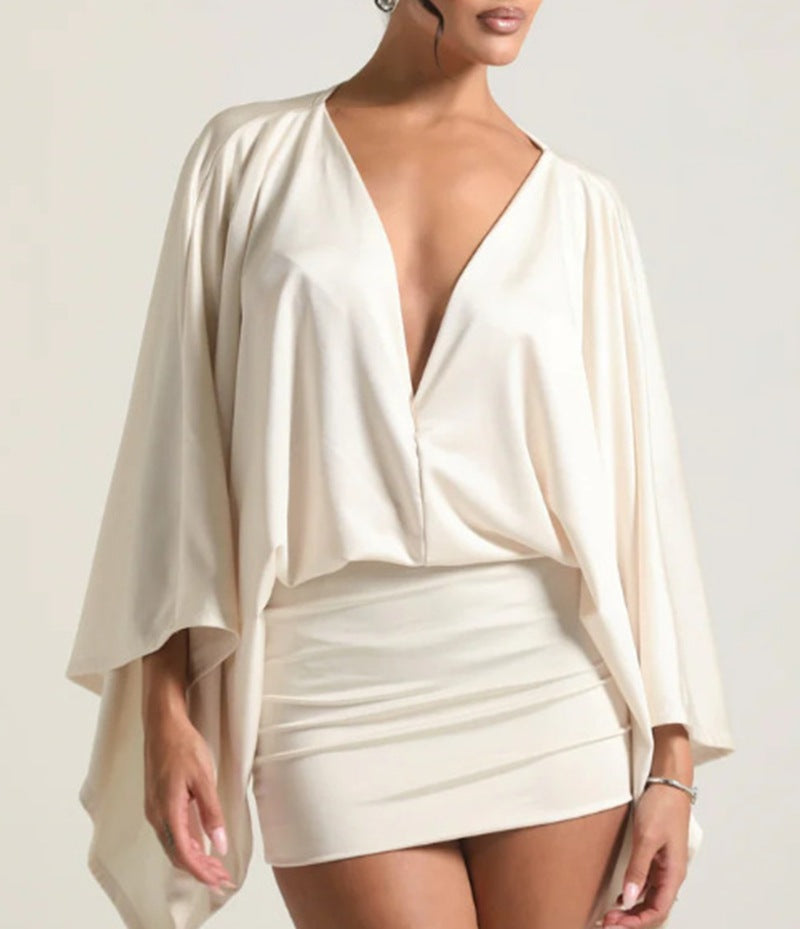 Women nan cape mini dress with deep V-neck, batwing sleeves and tailored mini skirt StylebySassy