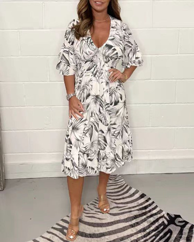 Women nan midi dress with leaf print, V-neck, gathered empire waist and ruffled tiers StylebySassy