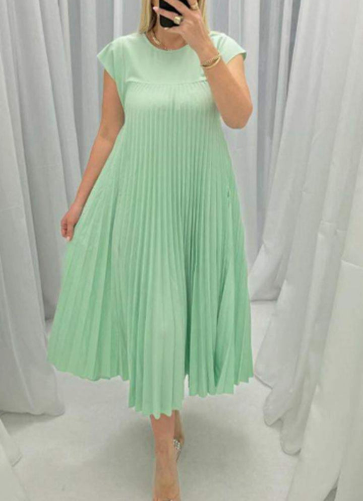 Women's flowing pleated maxi dress with dropped shoulders and side pockets StylebySassy